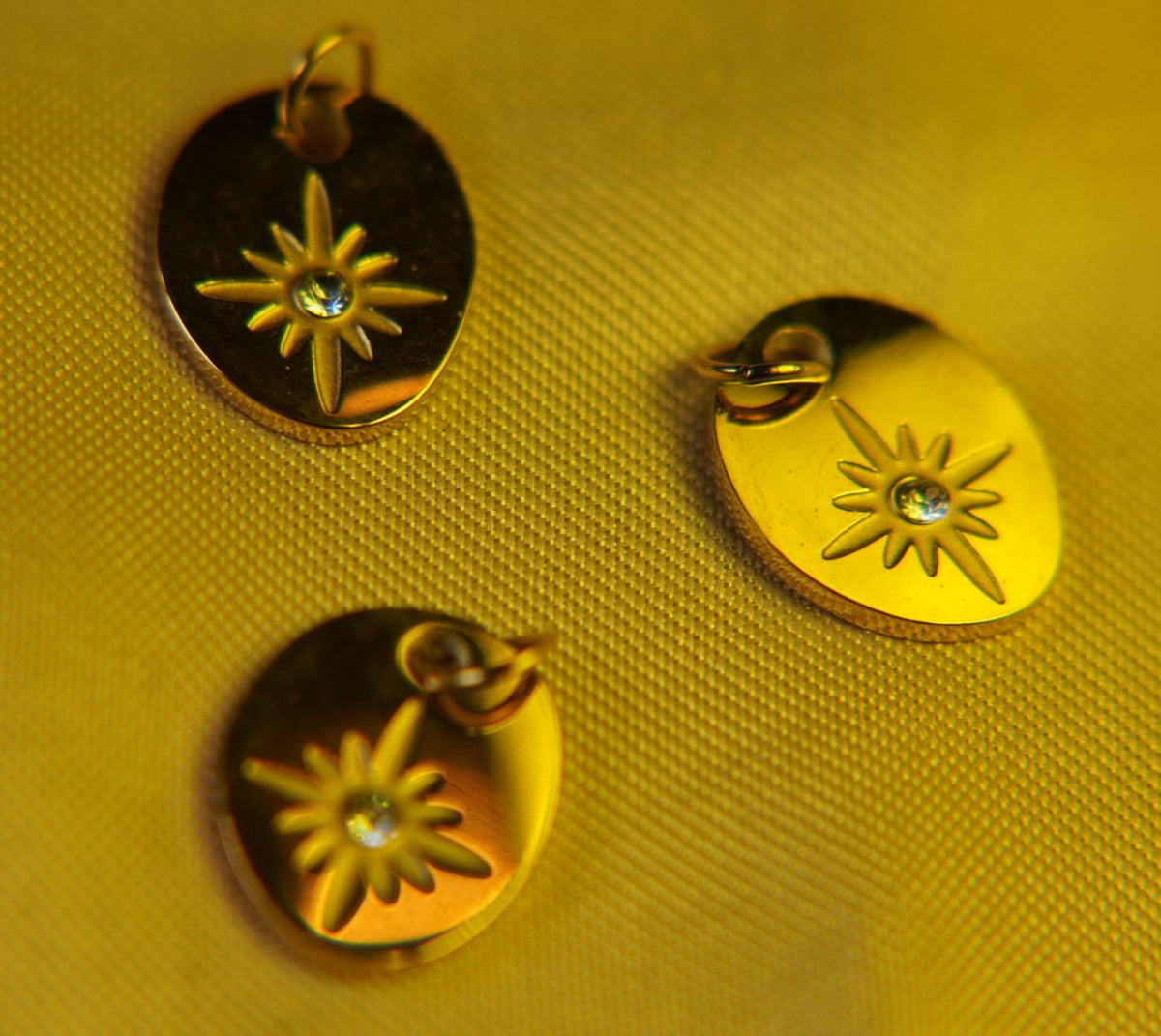 Oval Starburst Charm