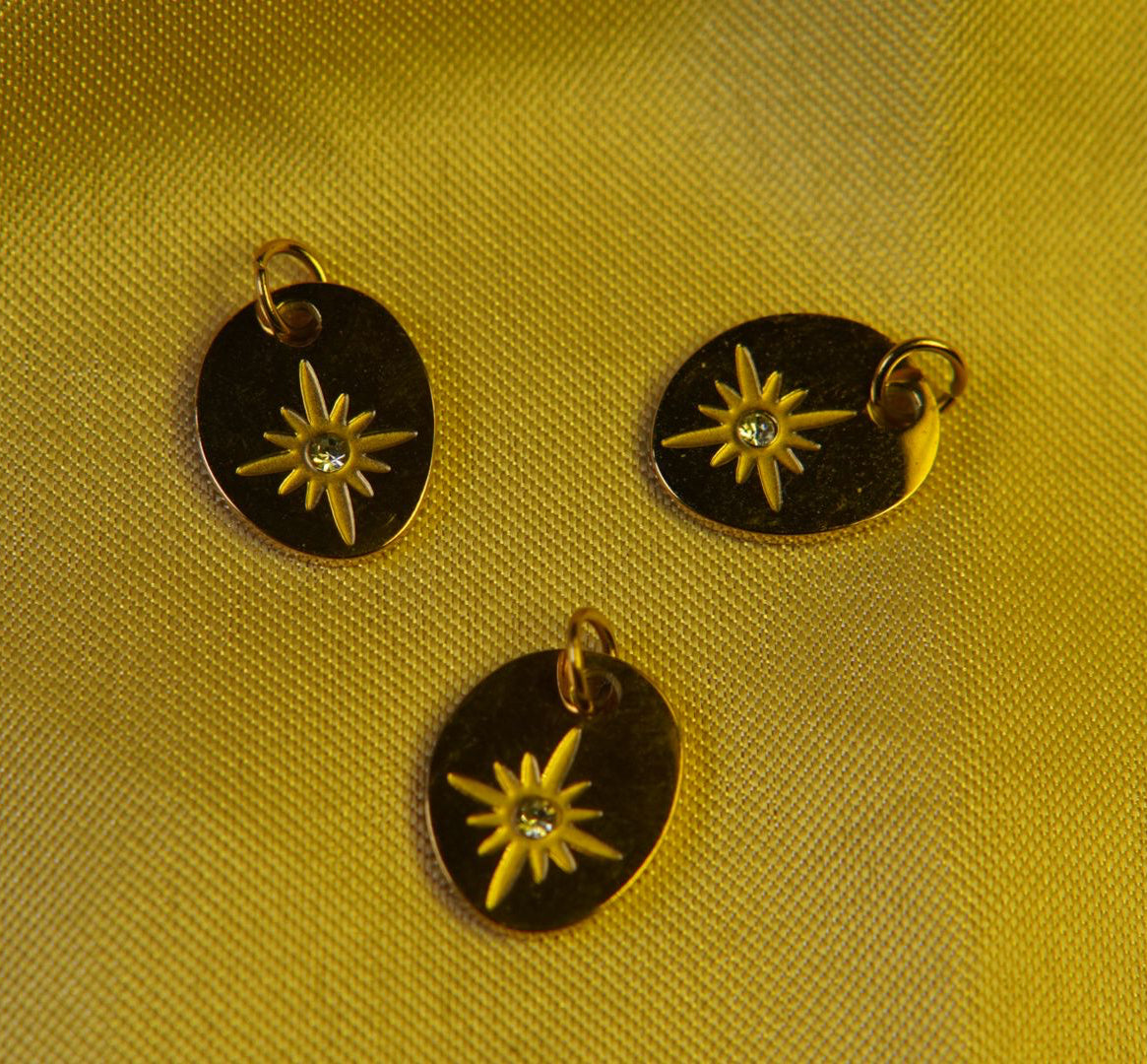 Oval Starburst Charm