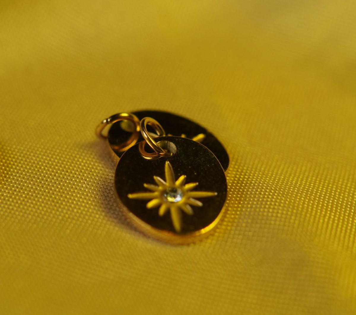 Oval Starburst Charm