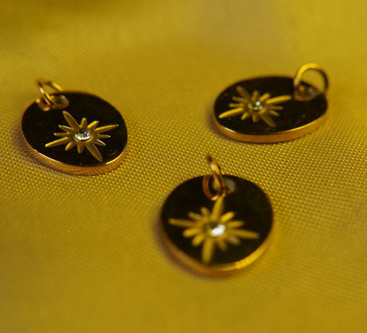 Oval Starburst Charm